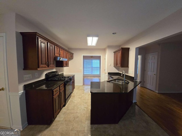 kitchen with sink and black range with gas cooktop