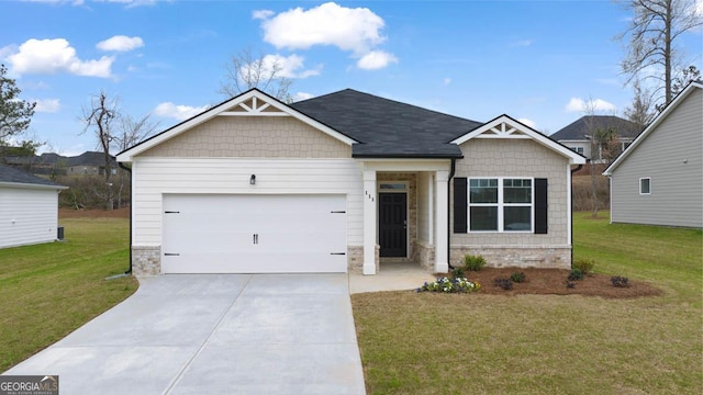 craftsman house with a garage and a front yard