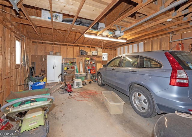 garage featuring a garage door opener