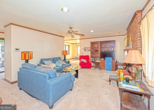 living room featuring ornamental molding, light colored carpet, and ceiling fan