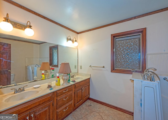 bathroom with ornamental molding, vanity, and toilet