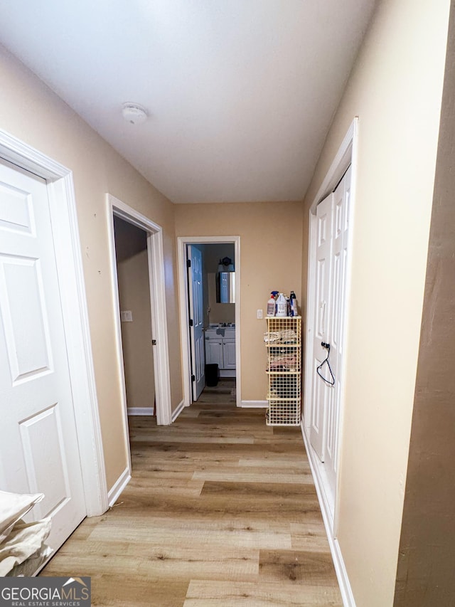 hall featuring light wood-type flooring