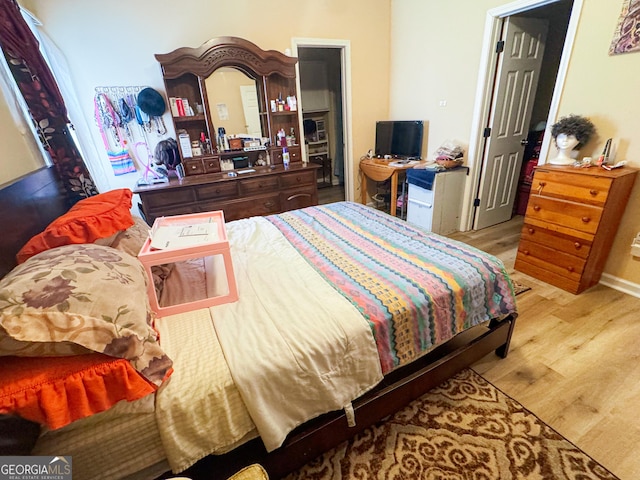 bedroom featuring light hardwood / wood-style flooring