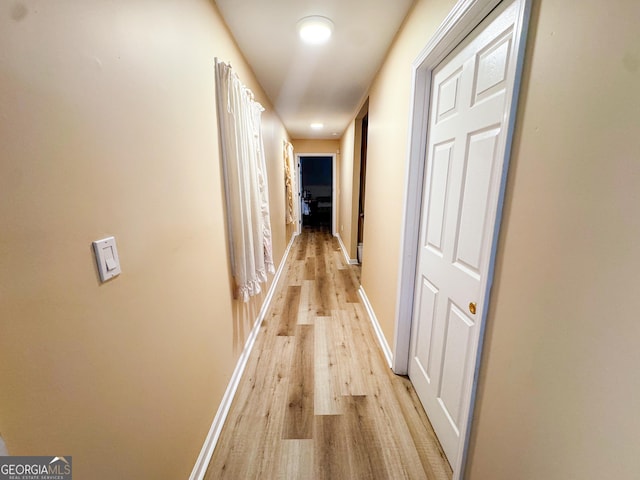 hall featuring light hardwood / wood-style flooring