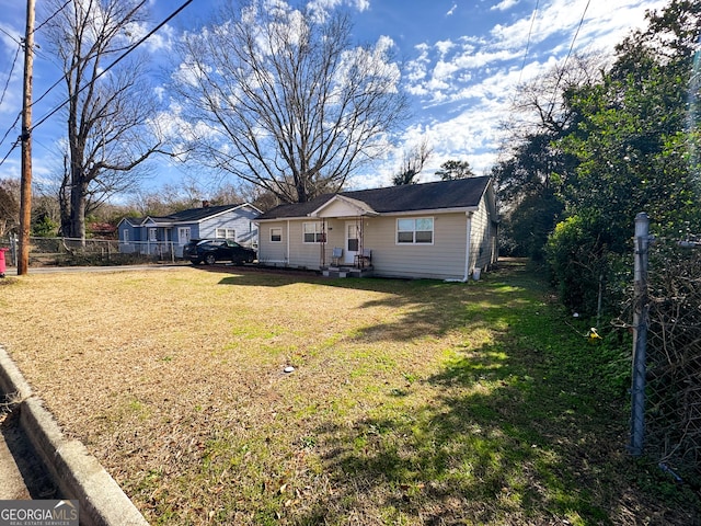 exterior space featuring a front yard