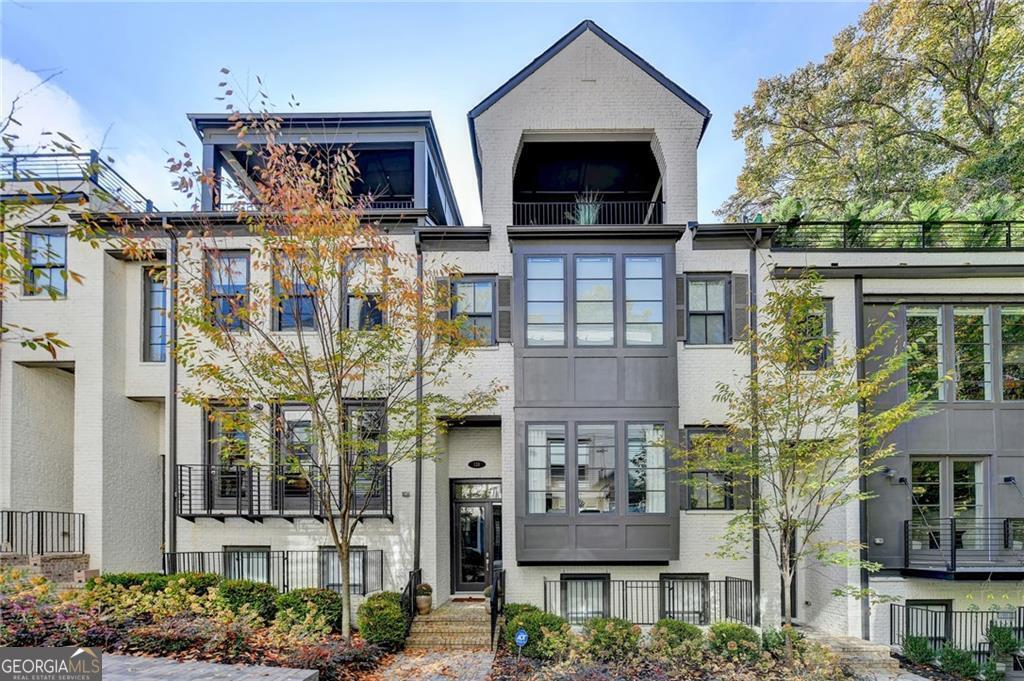 view of front of home with brick siding