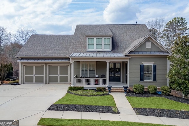 craftsman house featuring french doors, roof with shingles, a porch, concrete driveway, and a garage