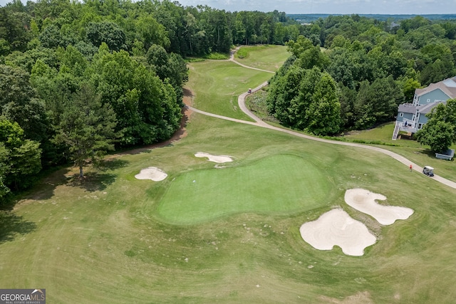 birds eye view of property with golf course view