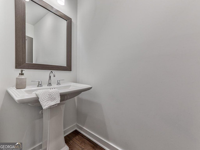 bathroom featuring hardwood / wood-style flooring