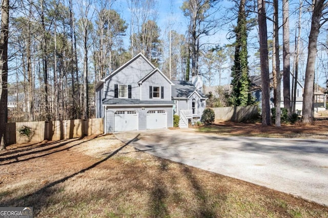 view of property exterior with a garage