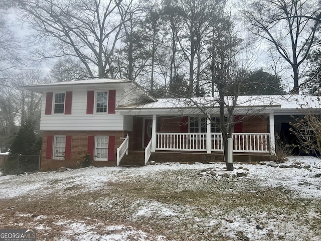 view of front of property featuring covered porch