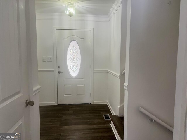 831 Bel Air Cir, Griffin, GA 30224 - foyer with dark wood-style flooring, visible vents, and ornamental molding