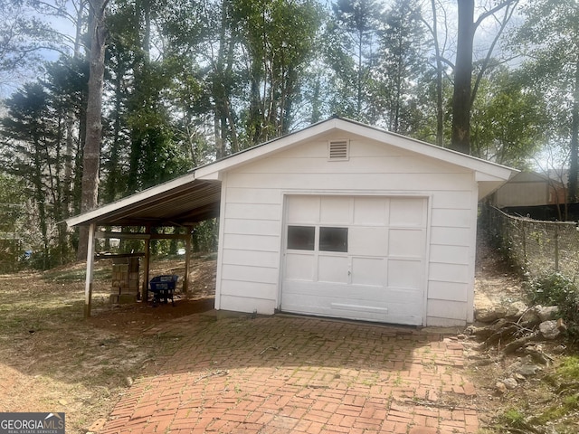 831 Bel Air Cir, Griffin, GA 30224 - detached garage featuring fence