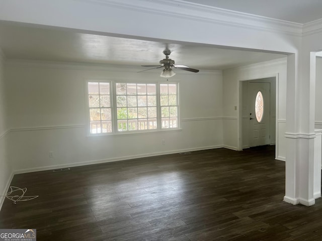 entryway featuring crown molding, dark wood-type flooring, and ceiling fan