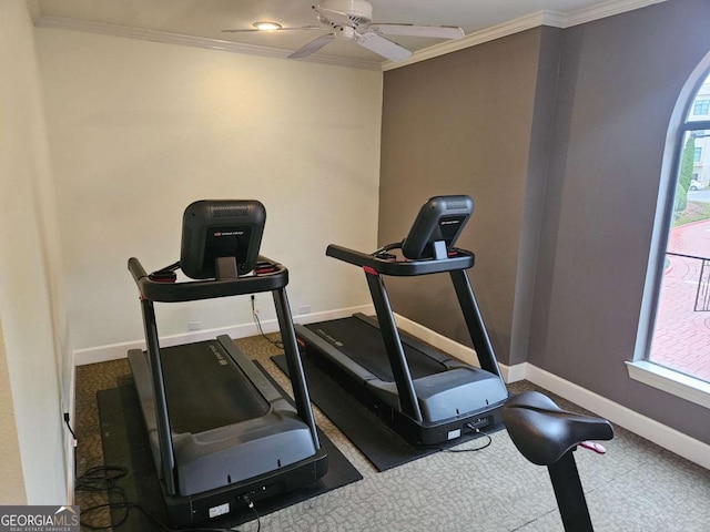 exercise area featuring ceiling fan, ornamental molding, and a healthy amount of sunlight