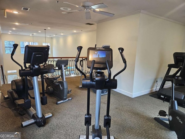 workout area featuring ornamental molding and ceiling fan