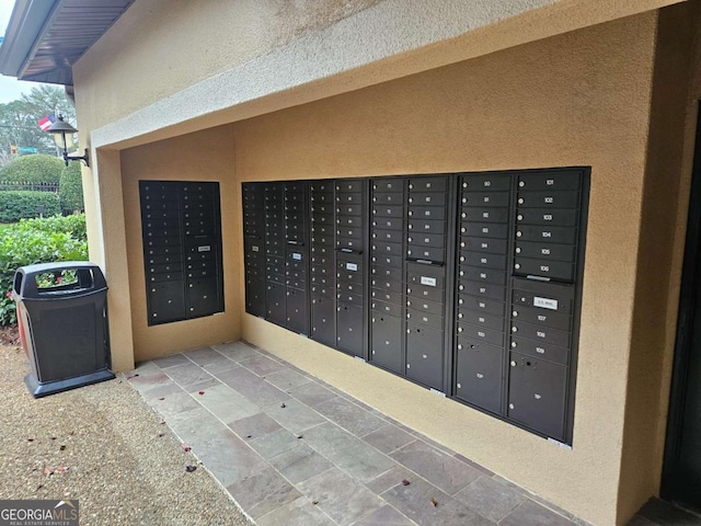 view of property's community featuring a mail area