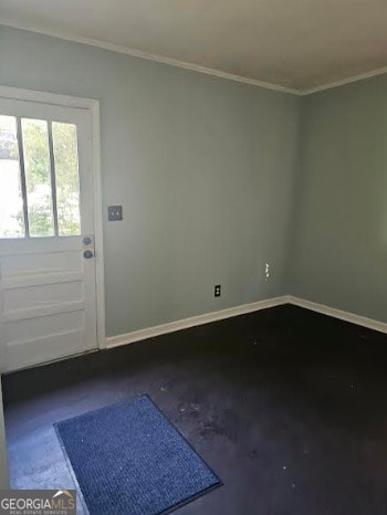 interior space with crown molding