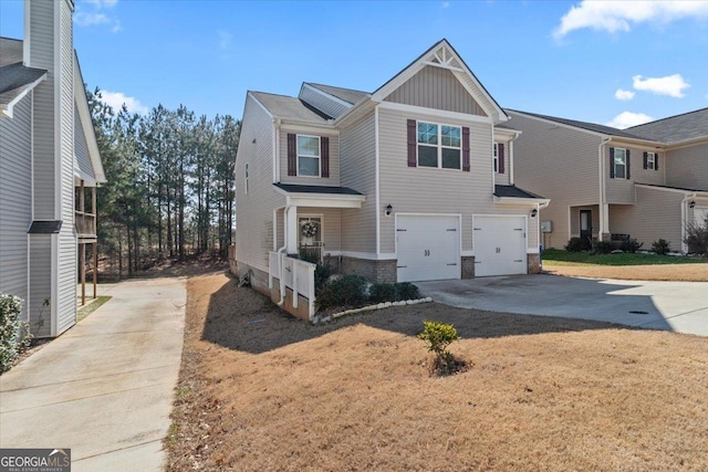 view of front of home with driveway, a garage, and board and batten siding