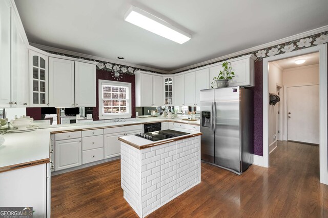 2290 Spencers Way, Stone Mountain, GA 30087 - kitchen featuring white cabinets, black appliances, light countertops, and crown molding