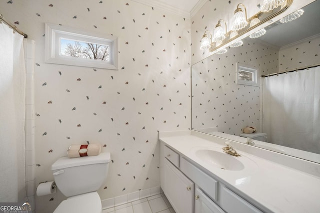 bathroom featuring tile patterned floors, toilet, crown molding, a shower with curtain, and vanity