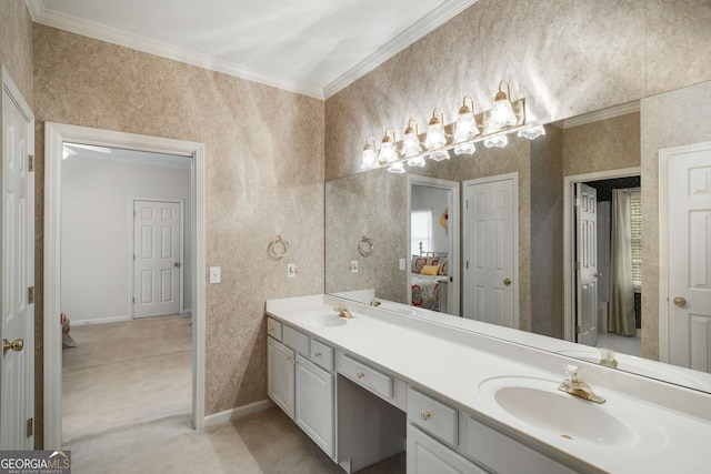 bathroom with crown molding and vanity