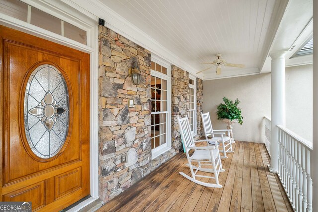 2290 Spencers Way, Stone Mountain, GA 30087 - property entrance featuring ceiling fan, stone siding, stucco siding, and covered porch