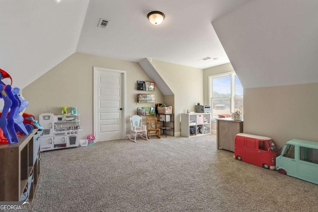 game room featuring carpet and lofted ceiling