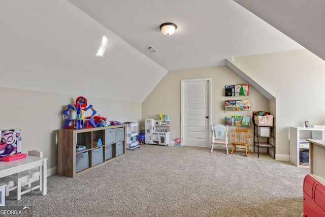 rec room featuring lofted ceiling and carpet flooring