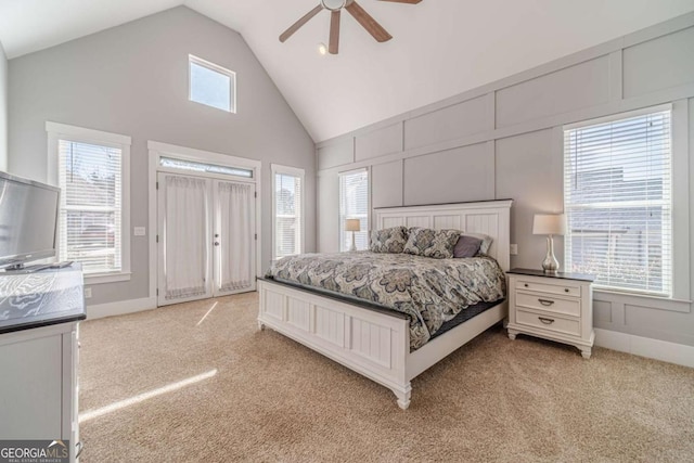 carpeted bedroom featuring ceiling fan, access to outside, and high vaulted ceiling