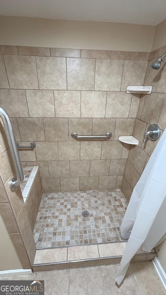 bathroom featuring walk in shower