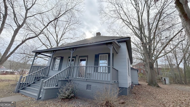 bungalow-style house featuring covered porch