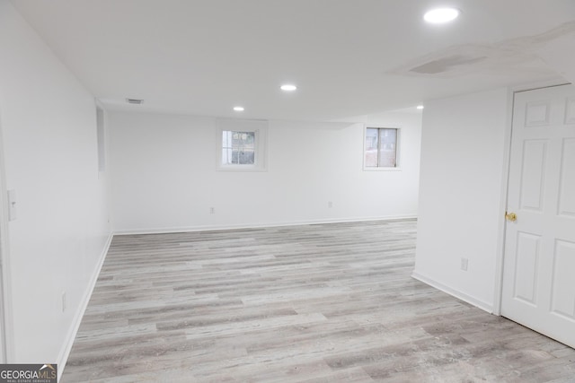 basement featuring light hardwood / wood-style flooring