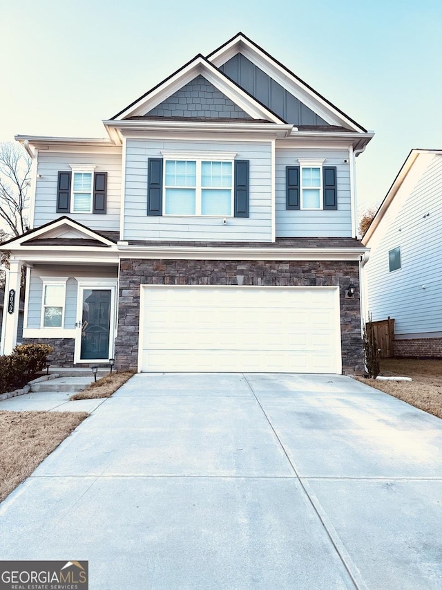 craftsman-style house featuring a garage