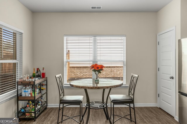 dining area featuring hardwood / wood-style flooring