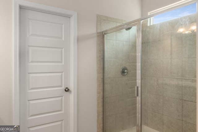 bathroom featuring walk in shower