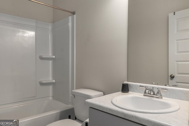 full bathroom with shower / tub combination, vanity, and toilet