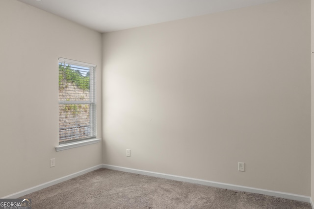 view of carpeted spare room