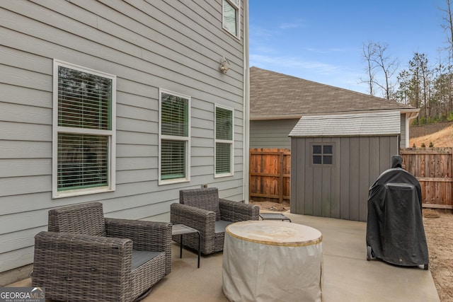 view of patio / terrace featuring a shed