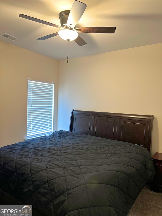 bedroom featuring ceiling fan