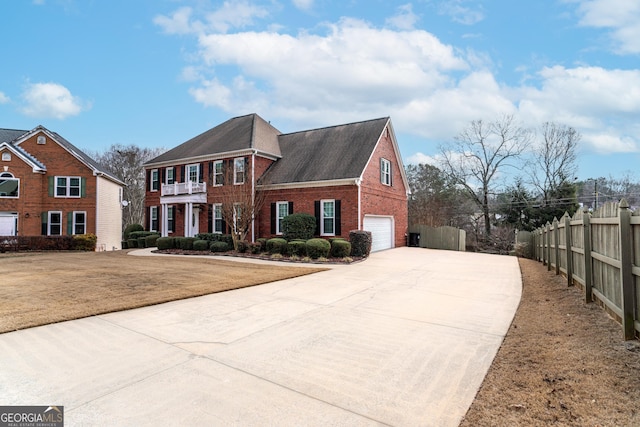 view of front of home featuring a garage and a front lawn