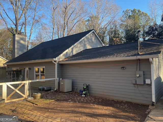 view of side of property featuring cooling unit