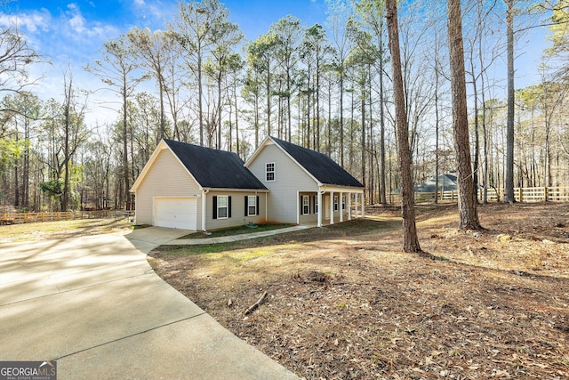 view of side of home with a garage