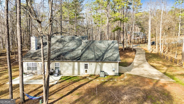 rear view of property with a patio area