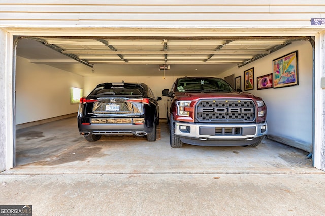 garage featuring a garage door opener