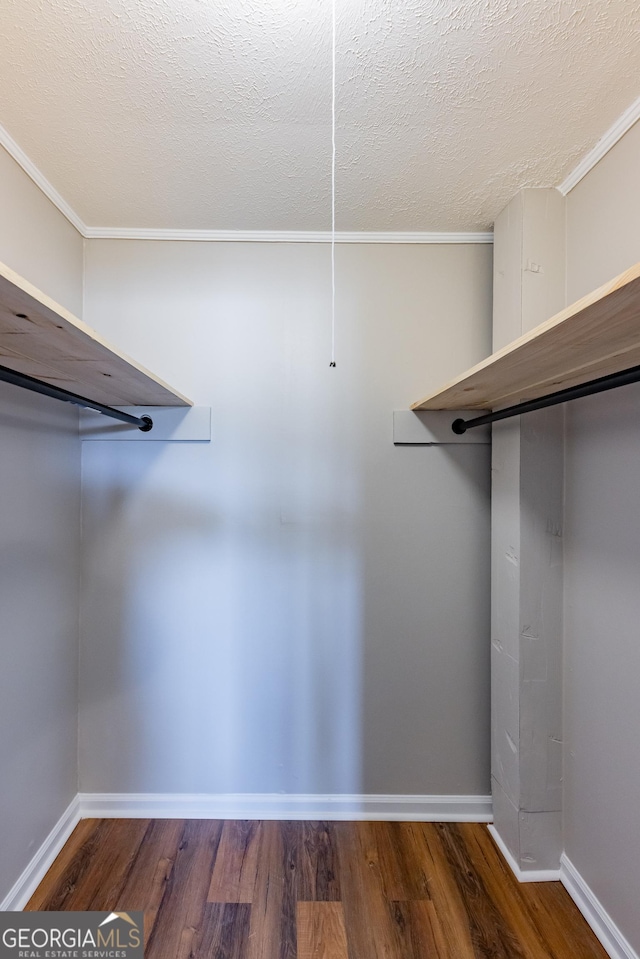 243 College St, Yatesville, GA 31097 - walk in closet featuring wood finished floors