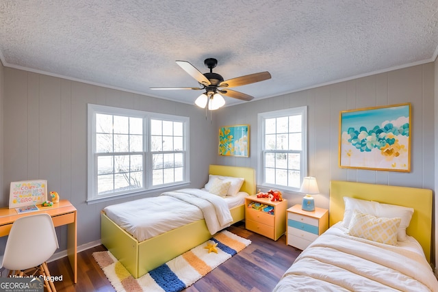243 College St, Yatesville, GA 31097 - bedroom with a textured ceiling, wood finished floors, ornamental molding, and a ceiling fan