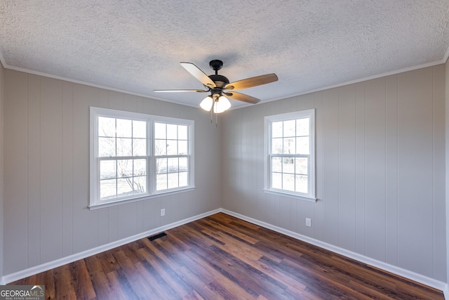 243 College St, Yatesville, GA 31097 - unfurnished room with dark wood-style flooring, a textured ceiling, ceiling fan, baseboards, and ornamental molding