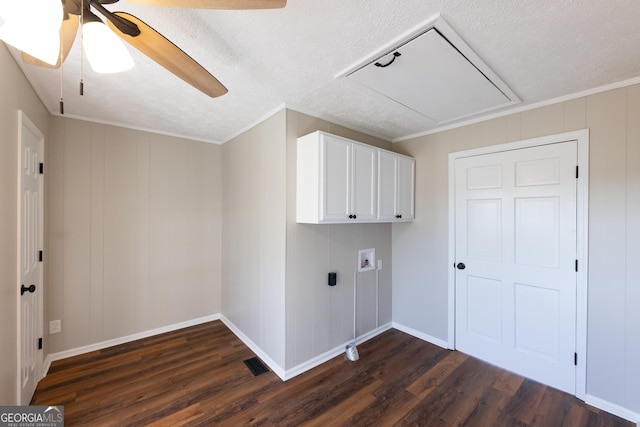 washroom with hookup for a washing machine, dark hardwood / wood-style floors, cabinets, and ceiling fan