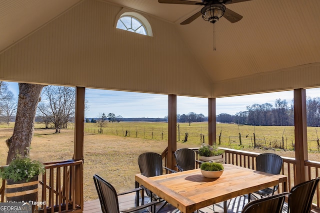 243 College St, Yatesville, GA 31097 - wooden terrace featuring a view of countryside, a ceiling fan, and outdoor dining space